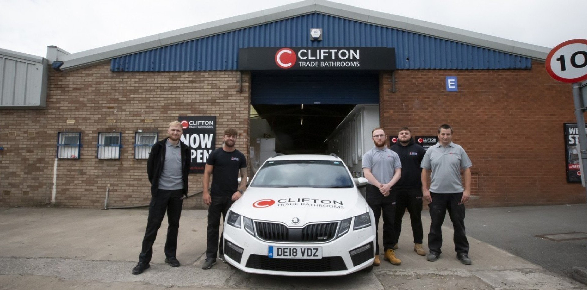 Staff Outside A Warehouse